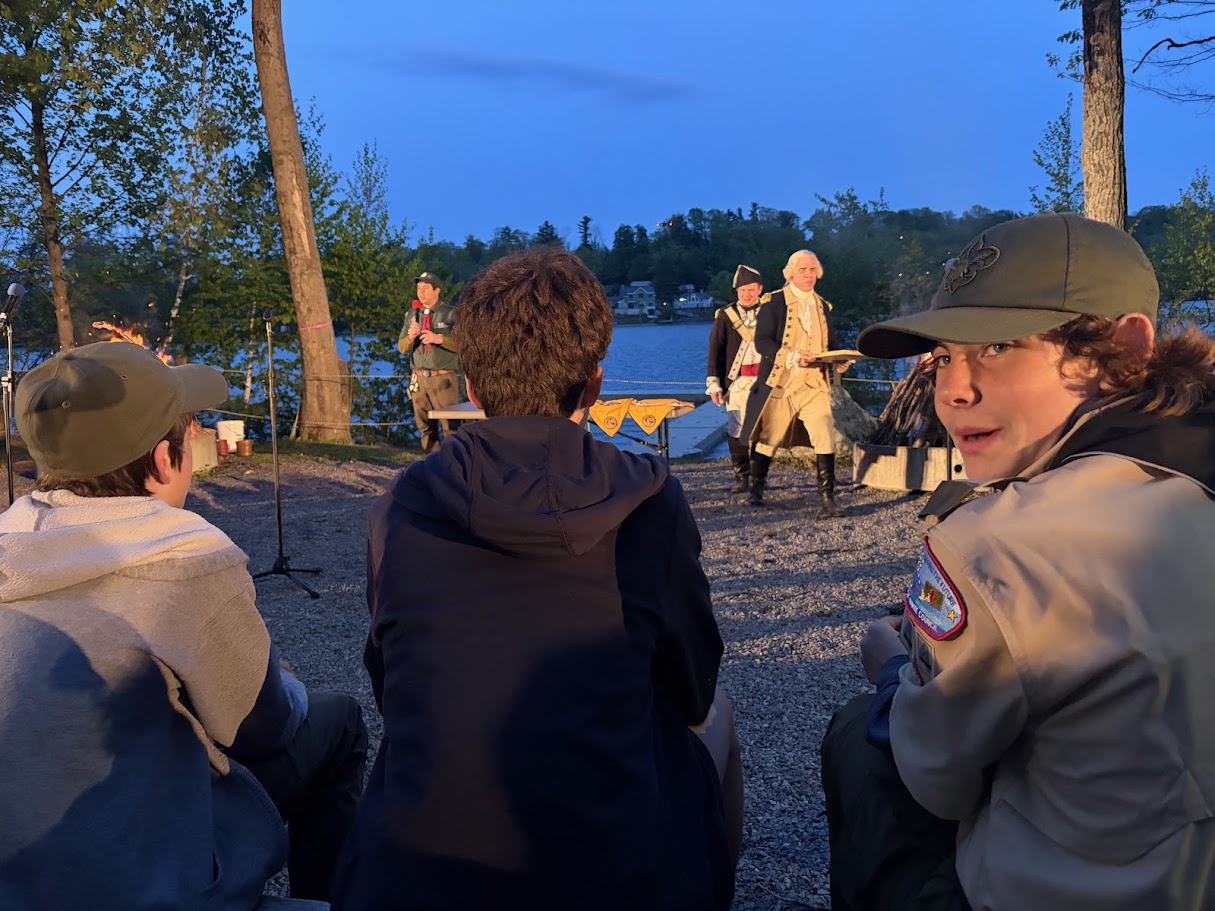 Scouts attending a campfire program at the camporee.